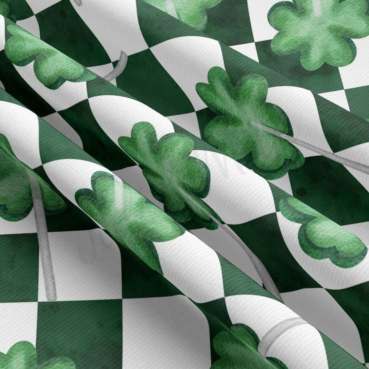 a green and white checkered pattern with shamrocks