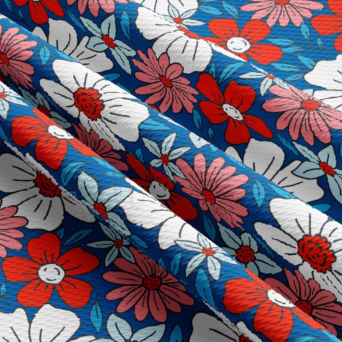 a close up of a blue and red flowered fabric