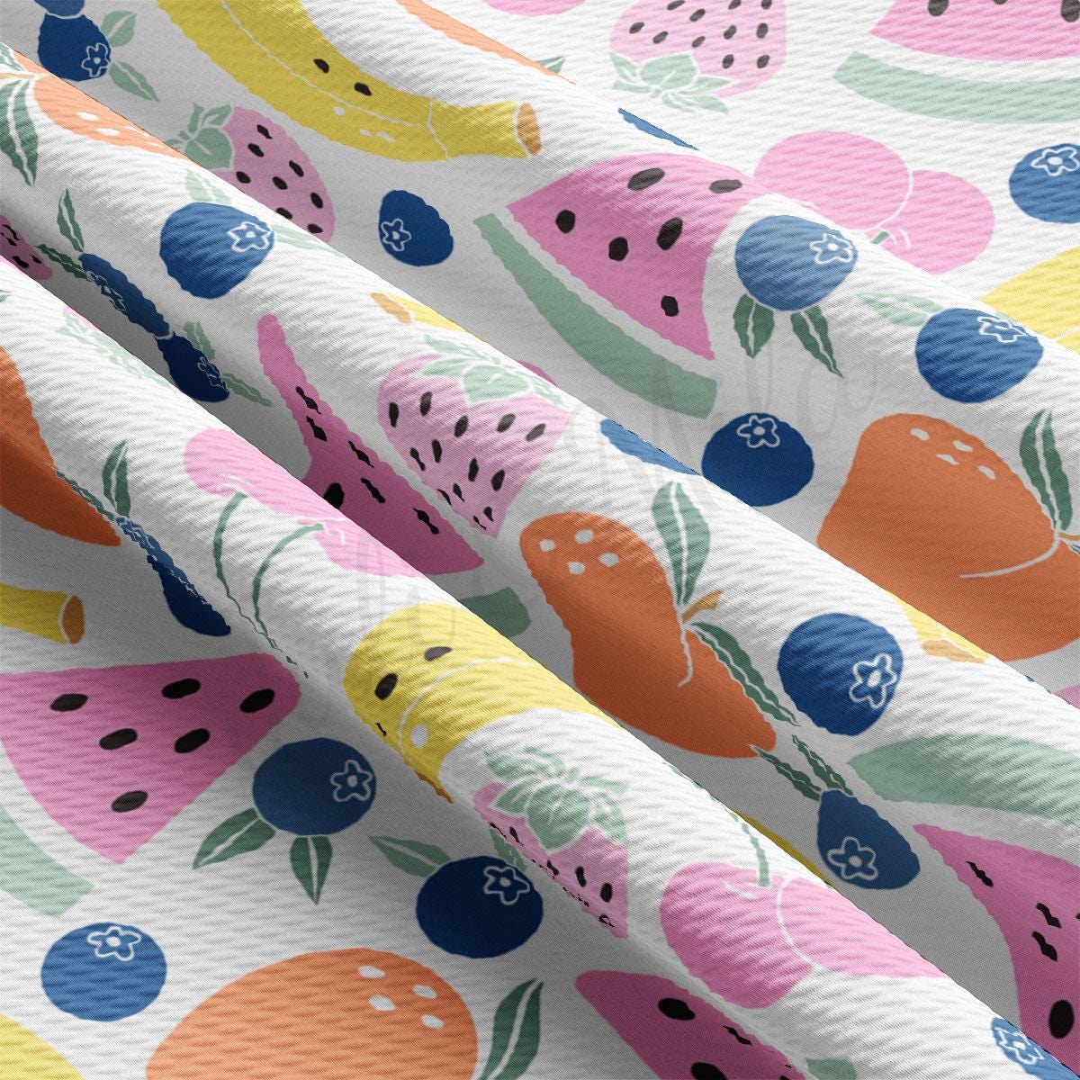 a close up of a pattern of fruit on a white background