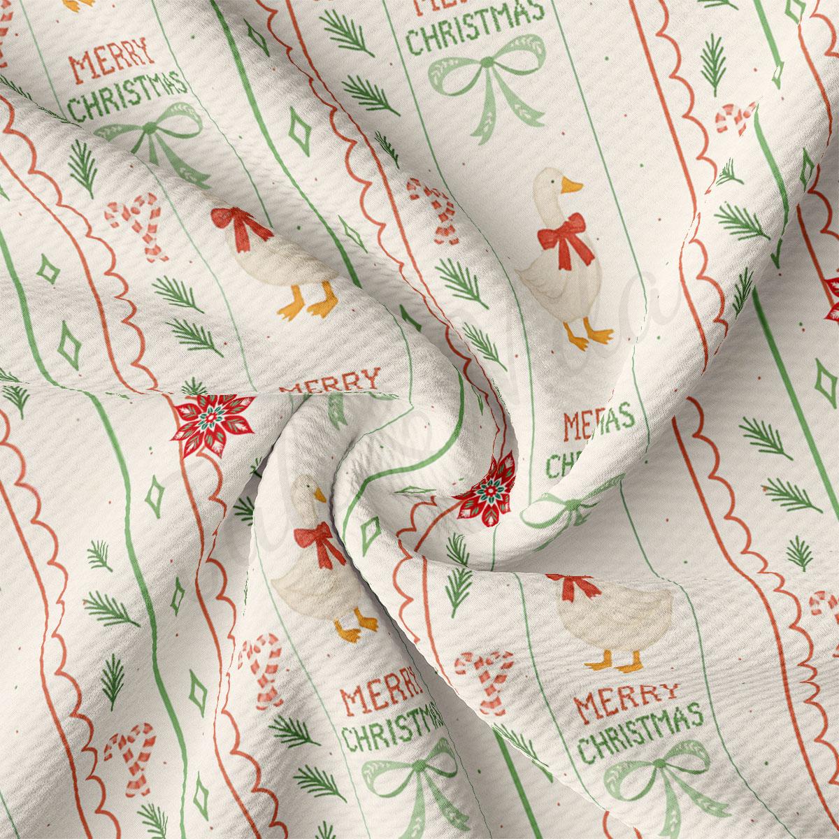 The image is a close-up of a fabric with a repeating pattern of Christmas-themed elements, including a white duck, green leaves, red bows, and the text "Merry Christmas".