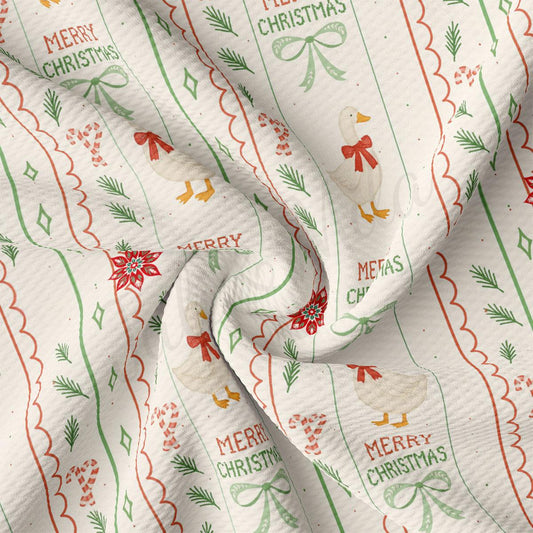 The image is a close-up of a fabric with a repeating pattern of Christmas-themed elements, including a white duck, green leaves, red bows, and the text "Merry Christmas".