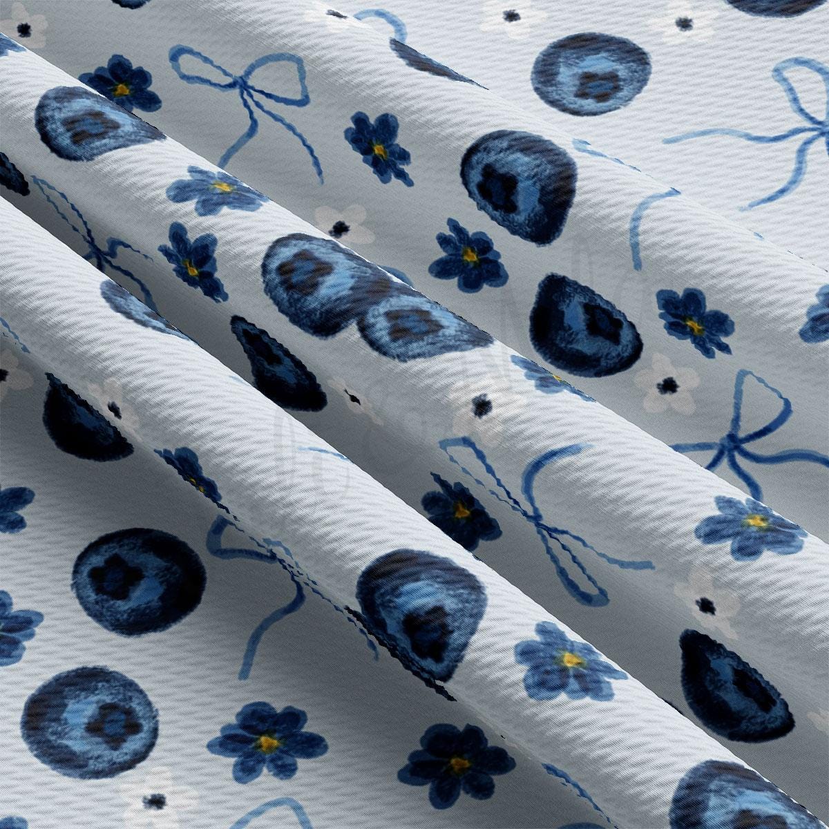 a close up of a blue and white flower pattern
