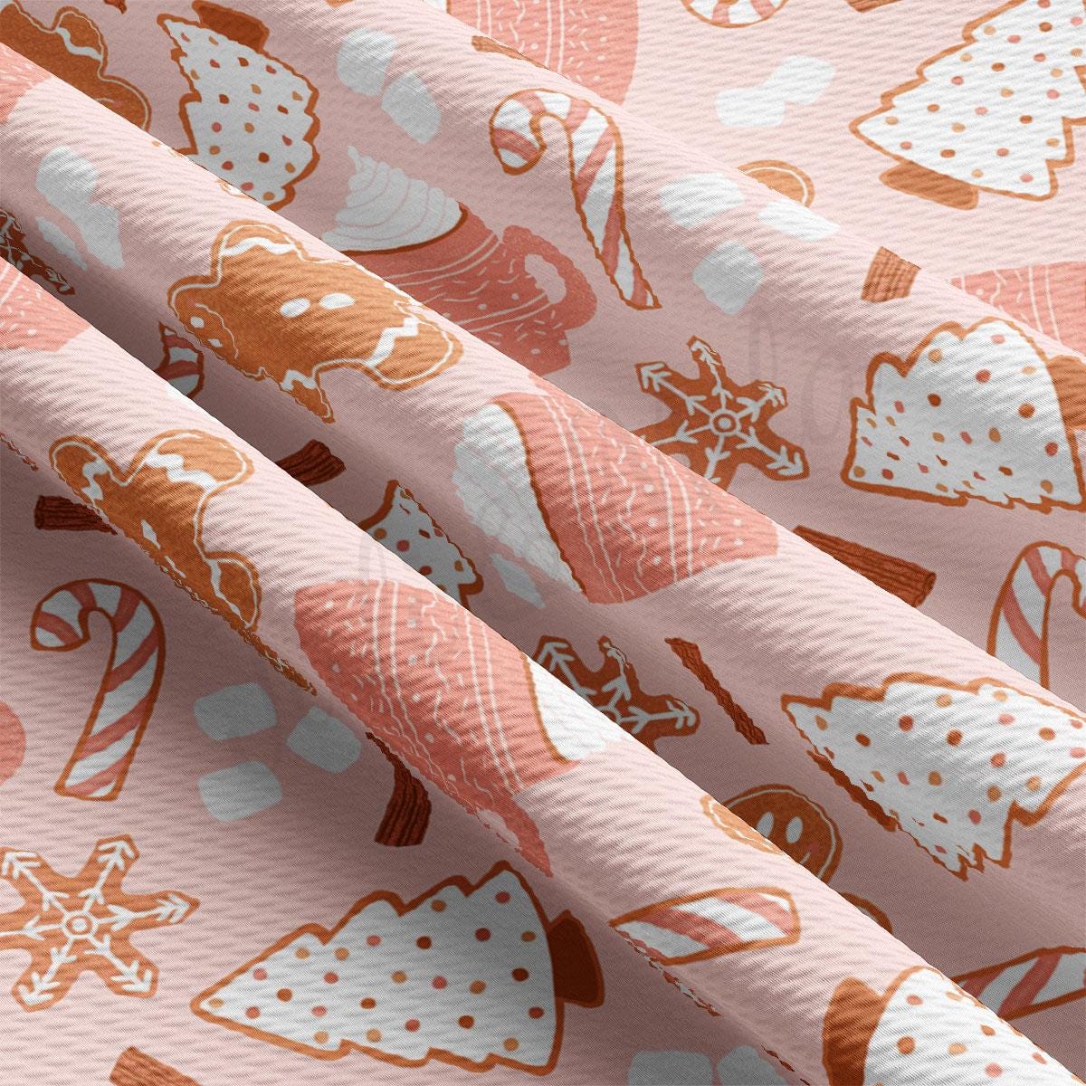 a close up of a pink and orange christmas pattern