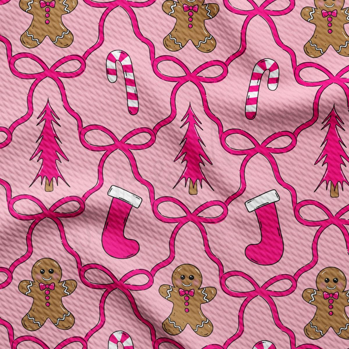 a repeating pattern of pink ribbons, gingerbread men, and candy canes on a pink background.