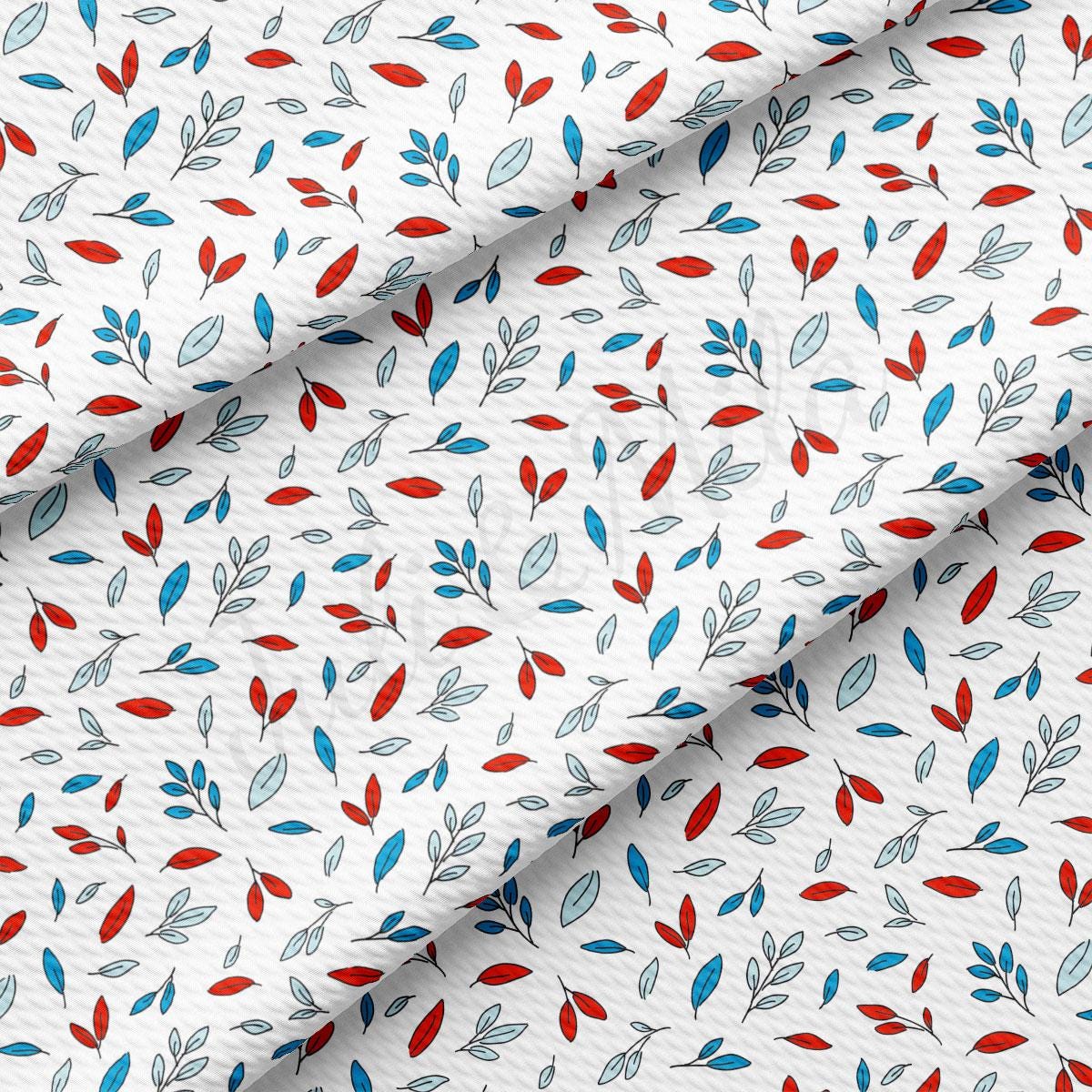 a white background with red, blue and green leaves