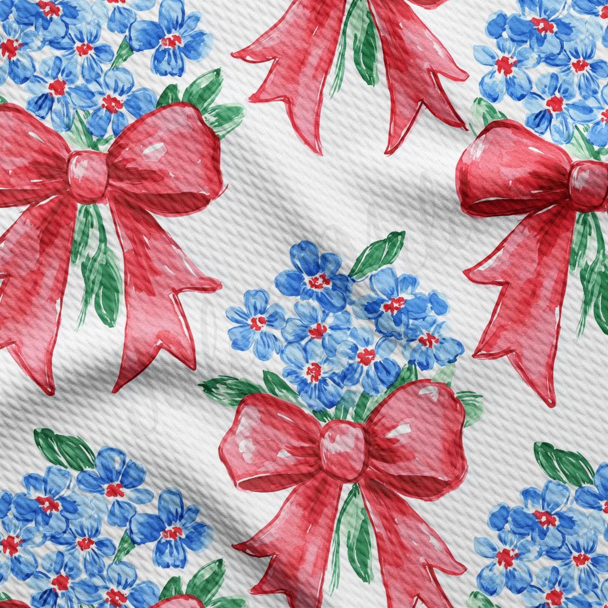 a red bow on a white background with blue flowers