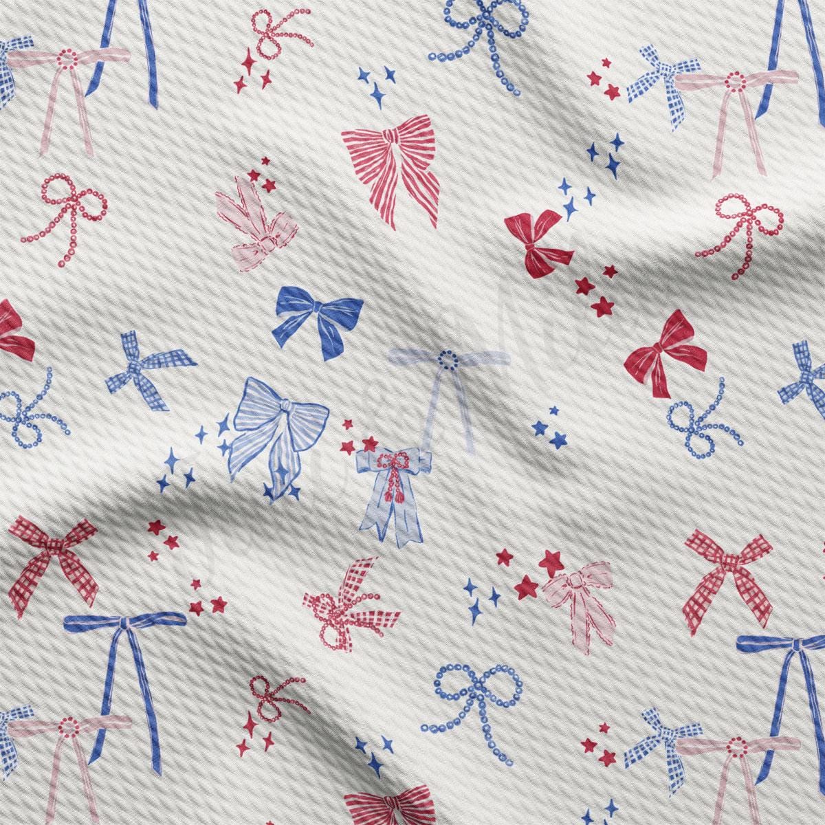 a white fabric with red, white, and blue bows on it