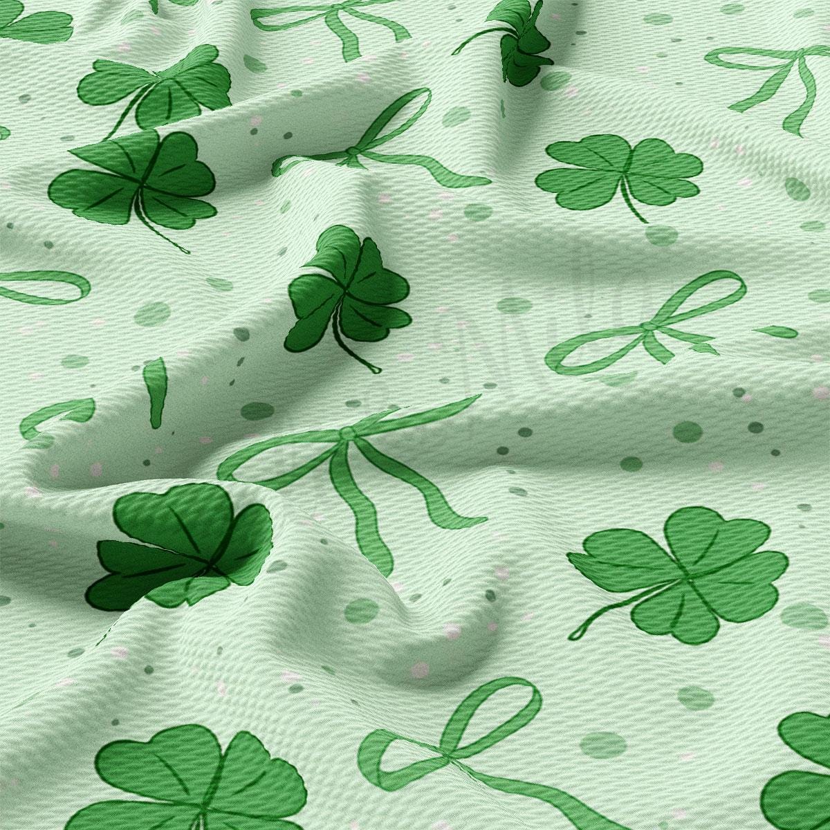 a green shamrock pattern on a white background