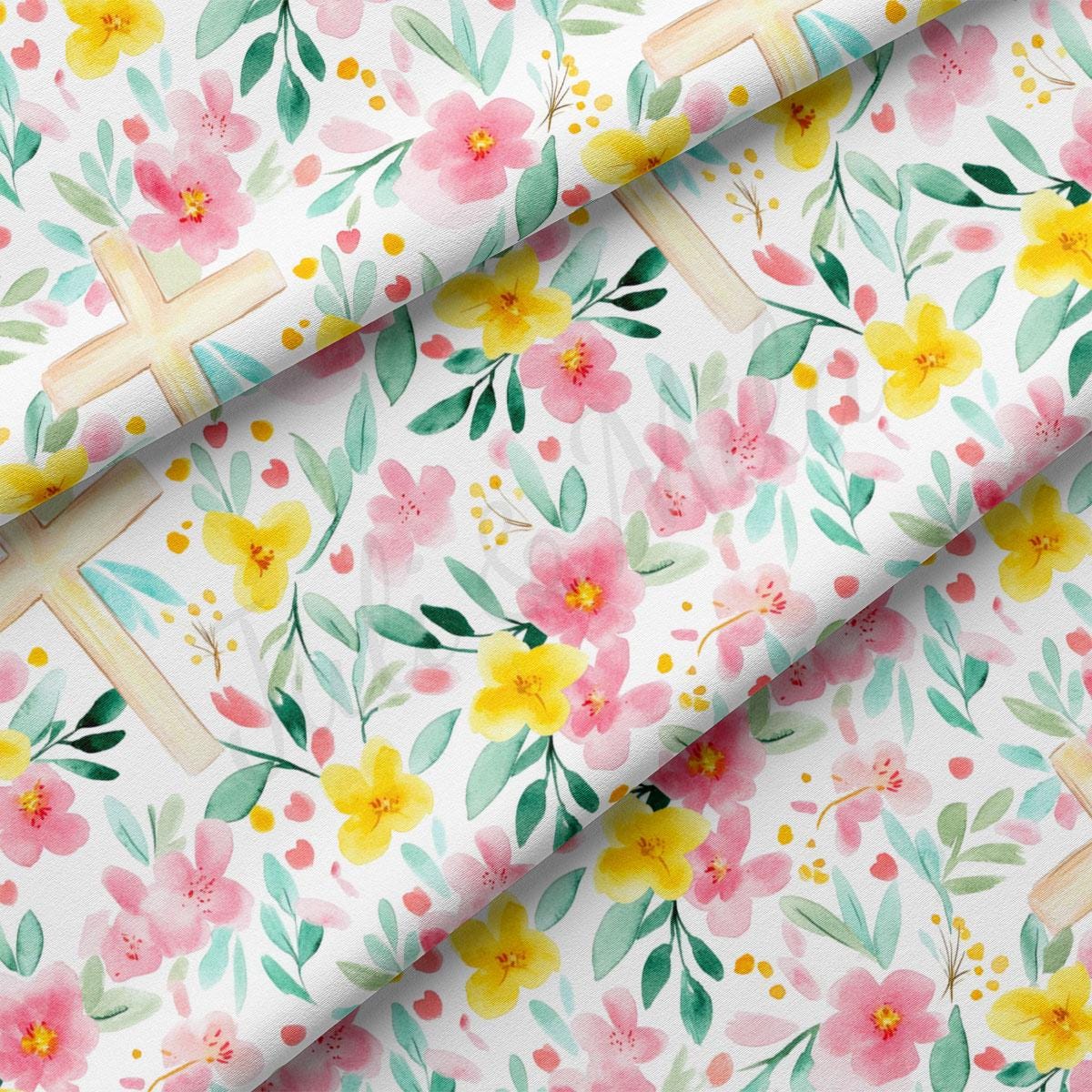 a floral fabric with a cross on it