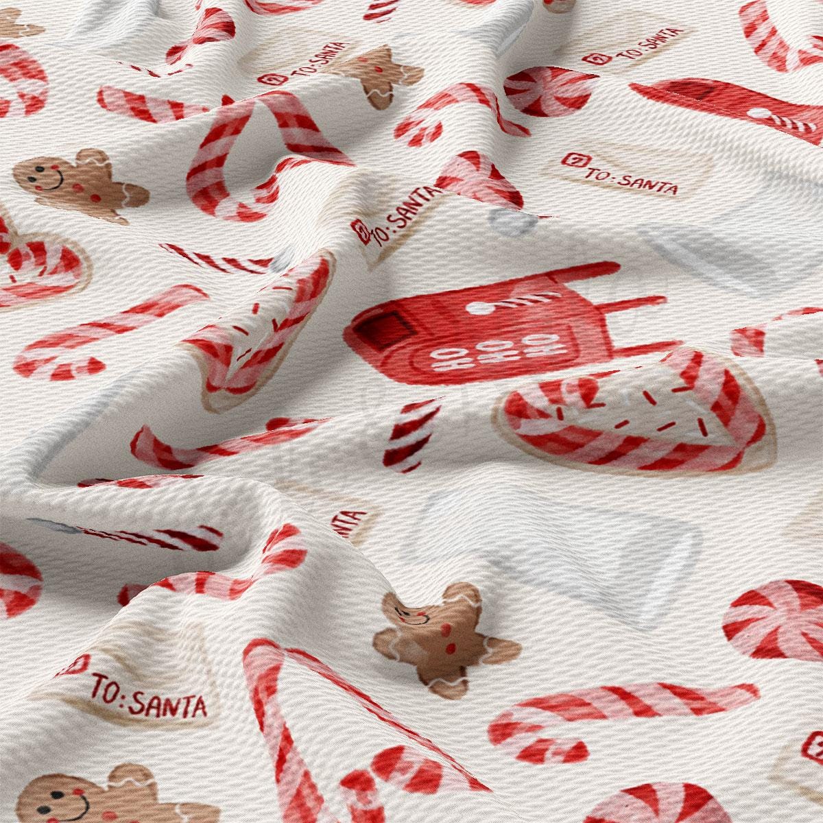 a white fabric with red and white candy canes