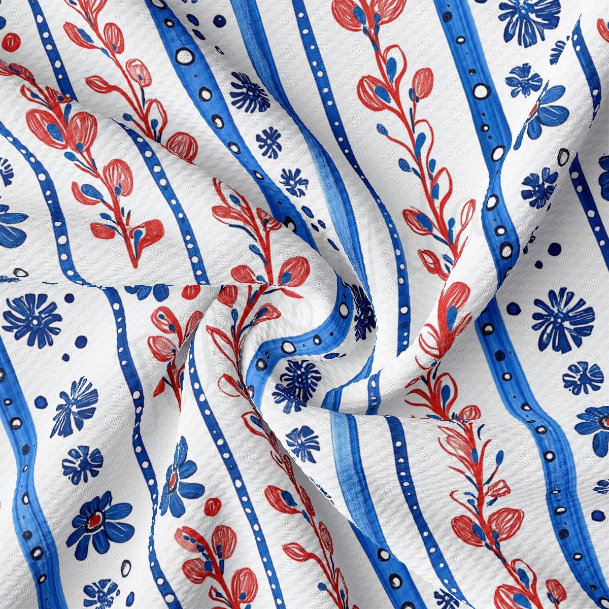 a close up of a blue and red floral print fabric