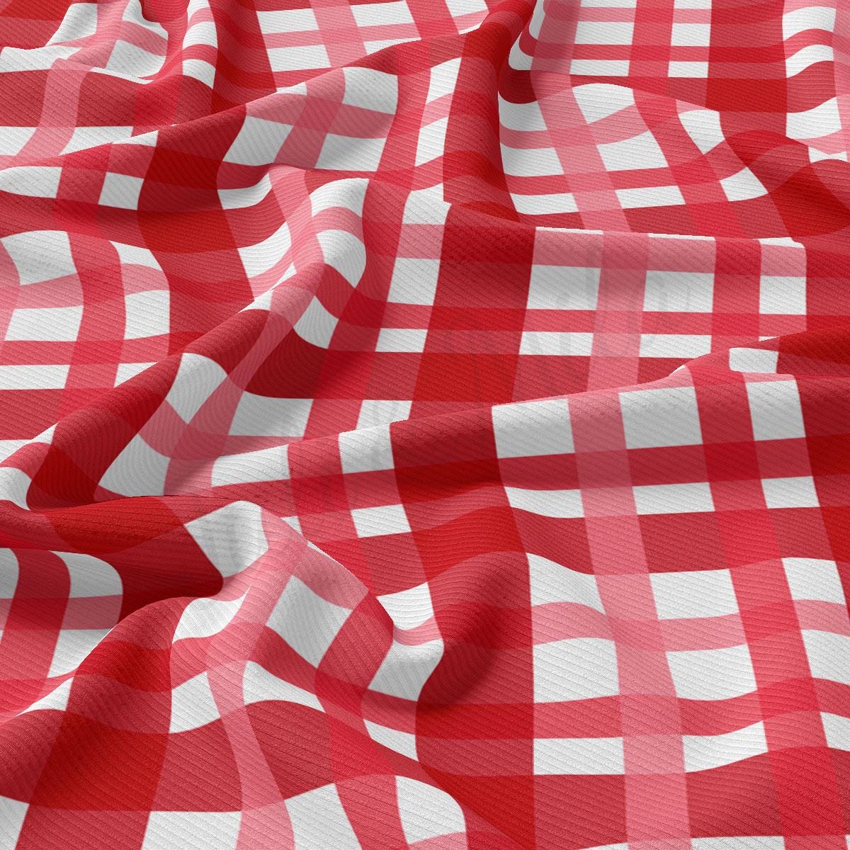 a red and white checkered fabric is shown