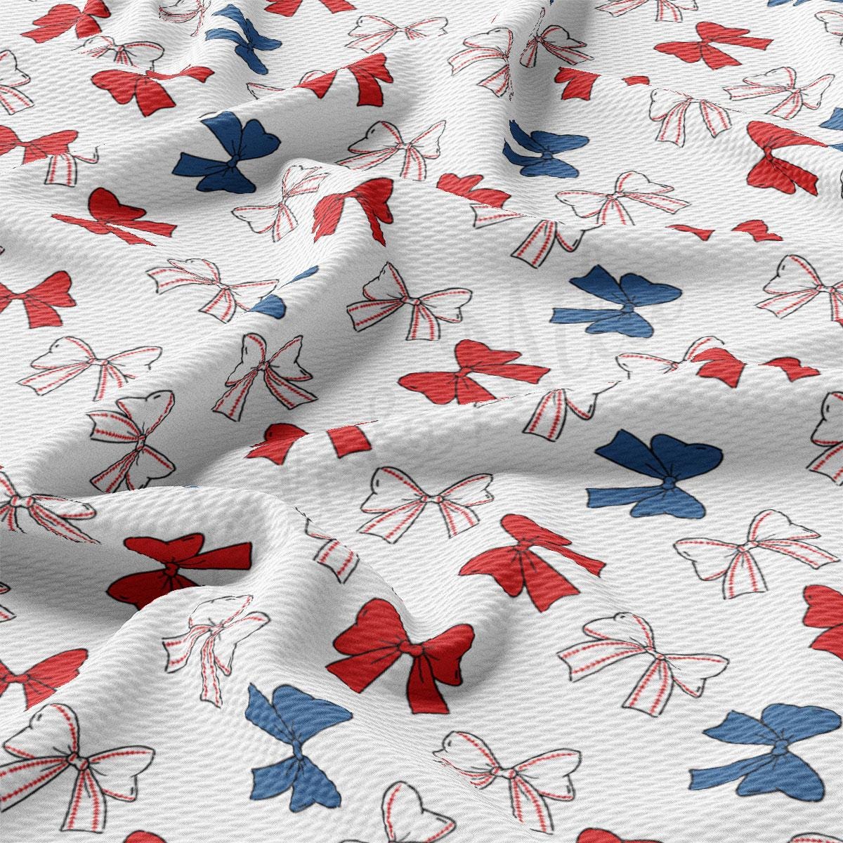 a red, white, and blue pattern of bows on a white background