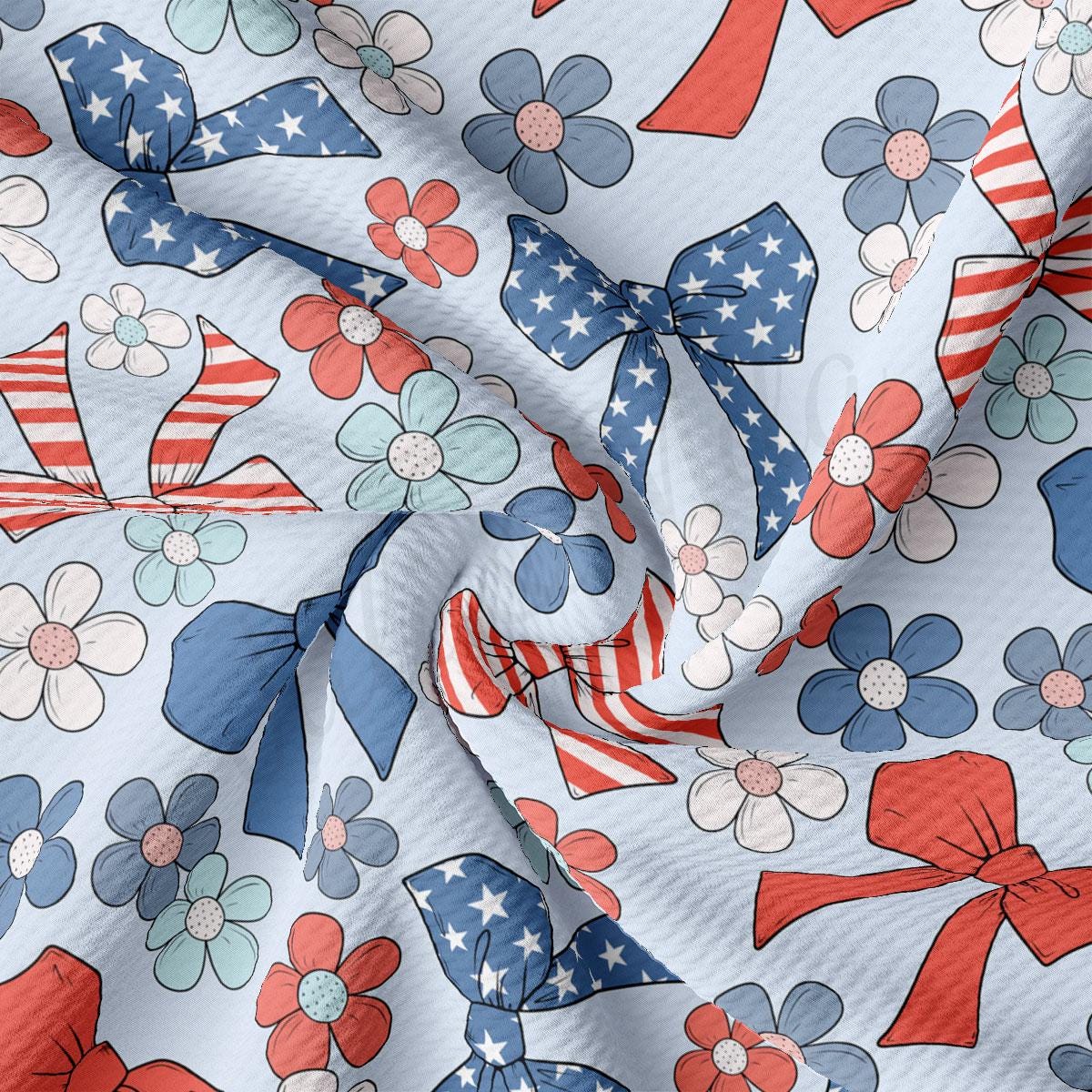 a close up of an american flag and flowers on a white background