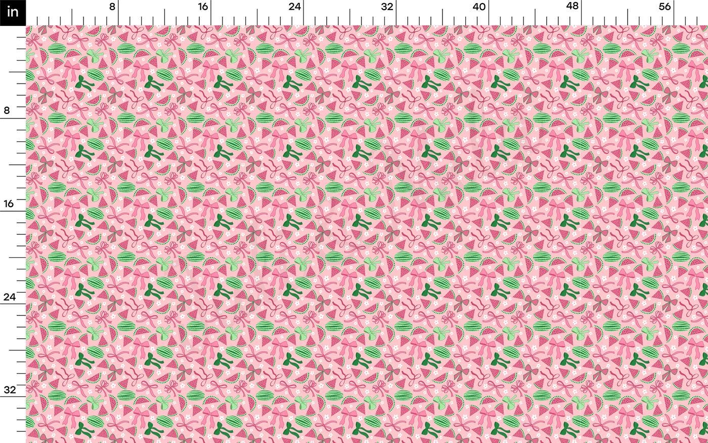 a pink background with green leaves on it