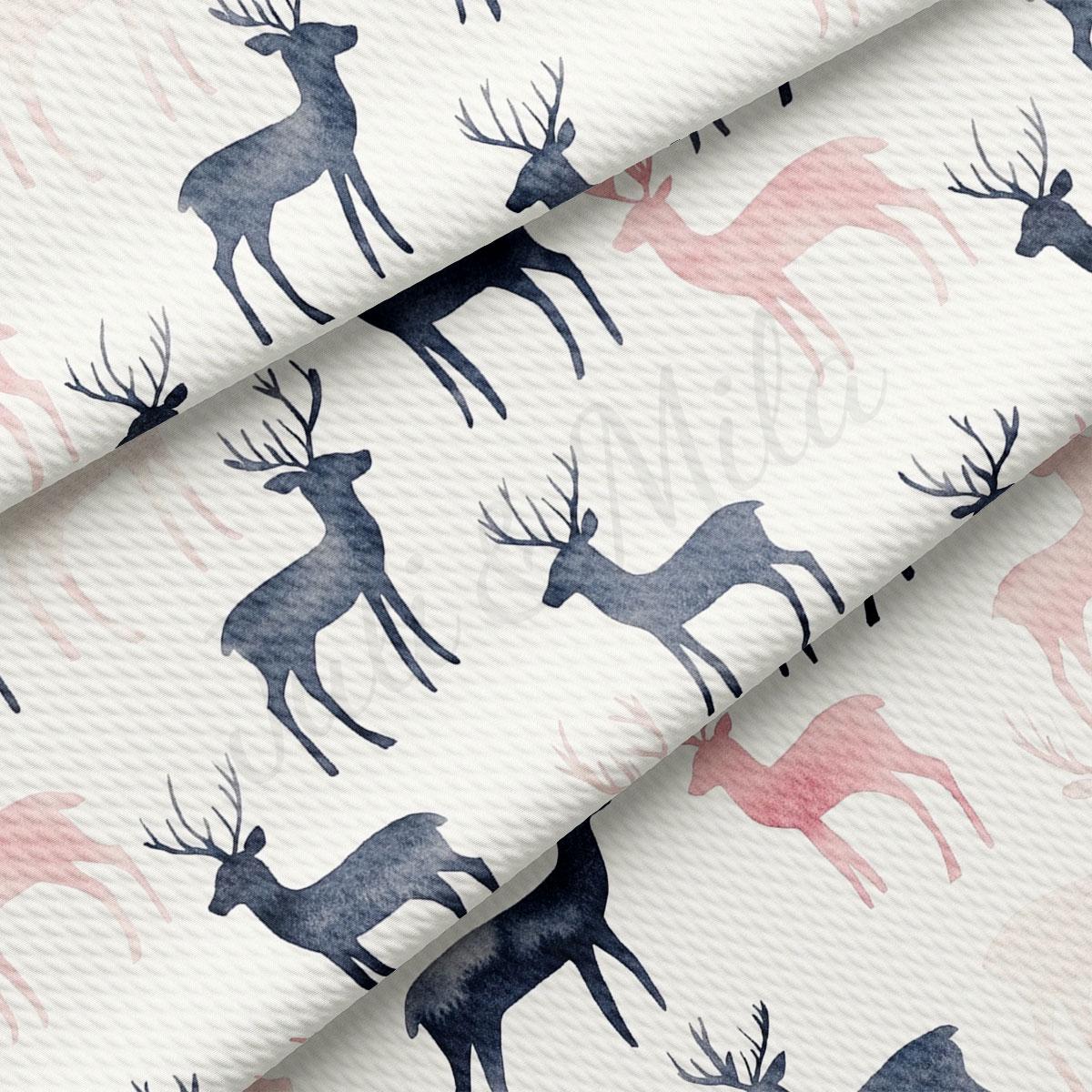 a repeating pattern of stylized deer silhouettes in shades of pink and blue against a white background.