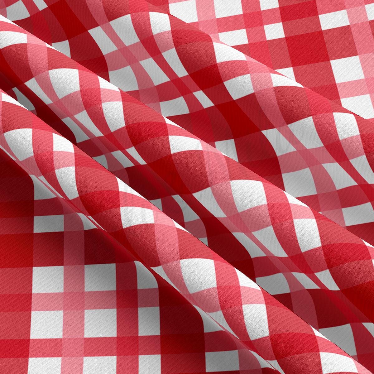a red and white checkered fabric is shown