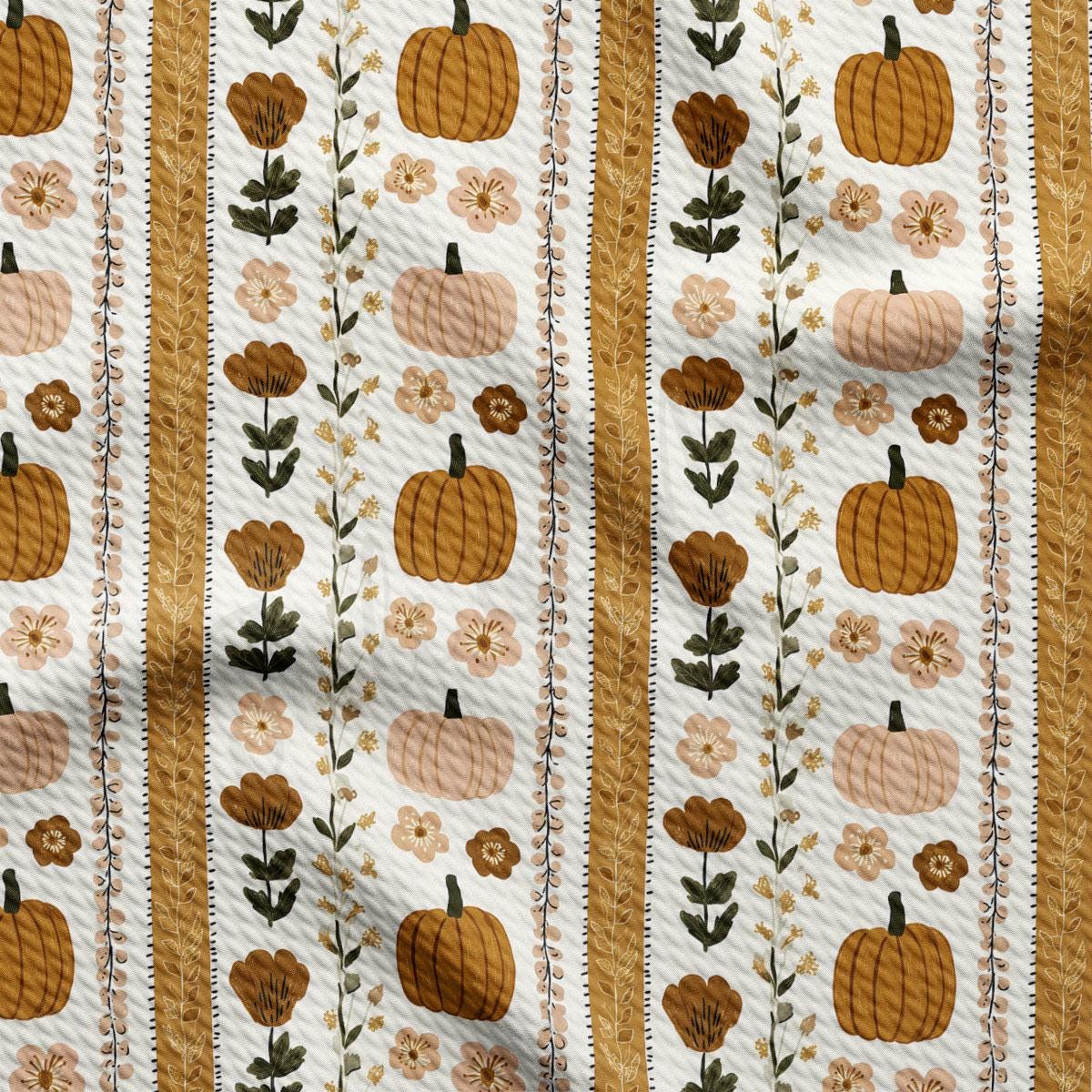 a repeating pattern of pumpkins, flowers, and leaves on a white background.