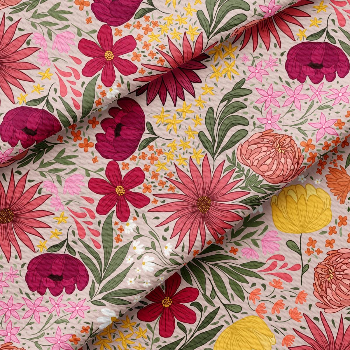 a pink and yellow floral print on a white background
