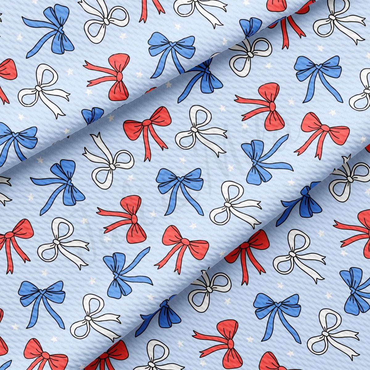 a blue background with red, white and blue bows