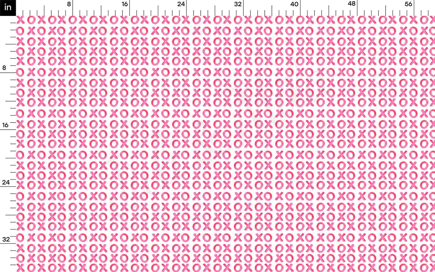 a pink and white pattern with a ruler in front of it