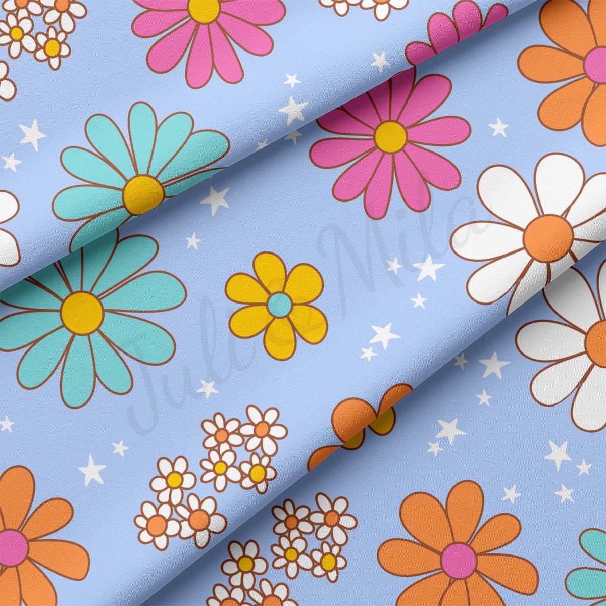 a close up of a flower pattern on a blue background