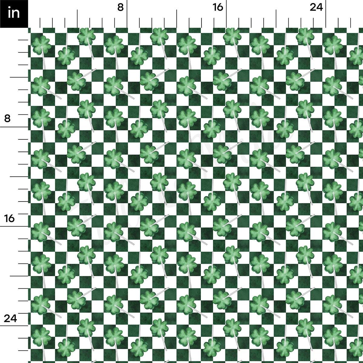 a green and white checkered pattern with four leaf clovers