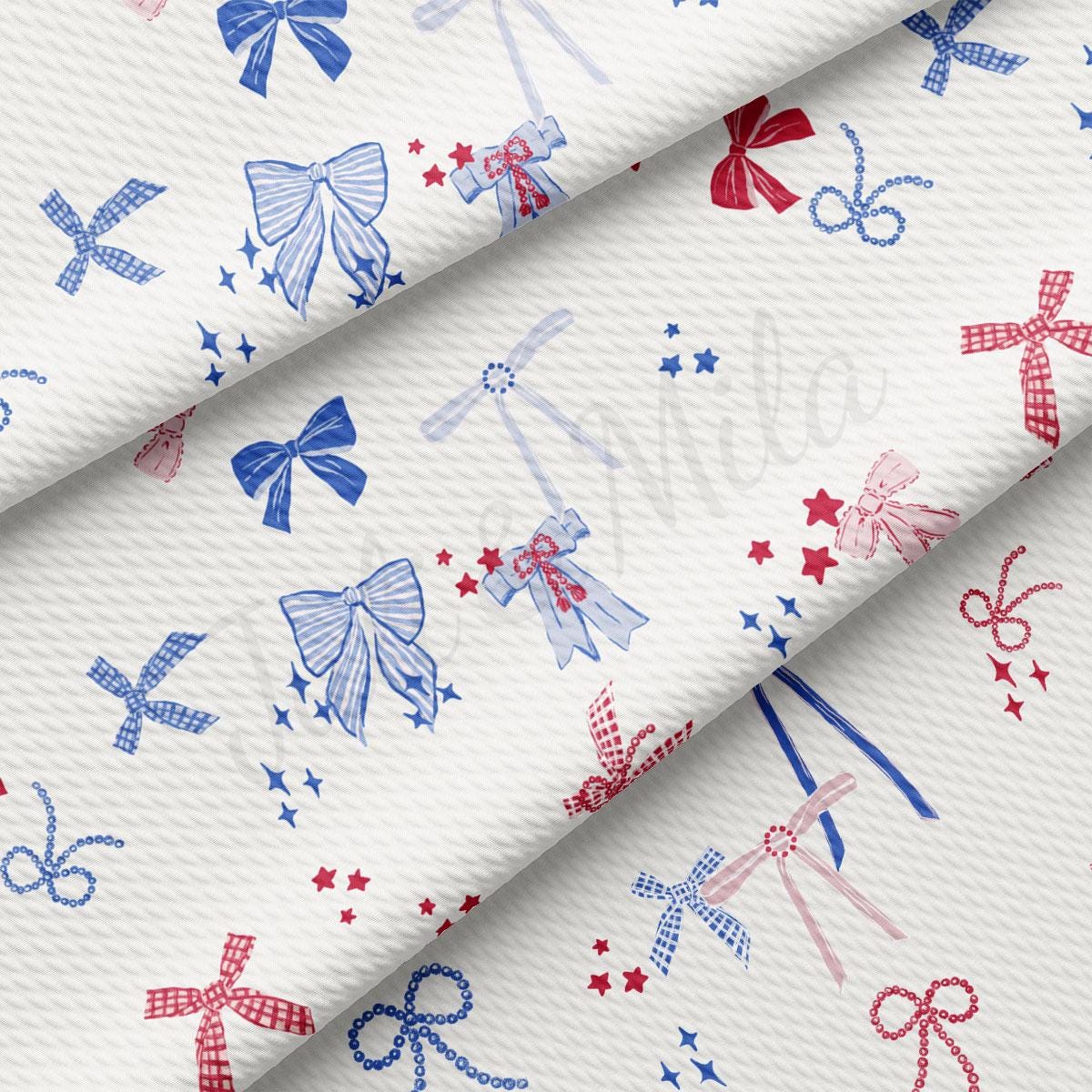 a white fabric with red, white and blue designs