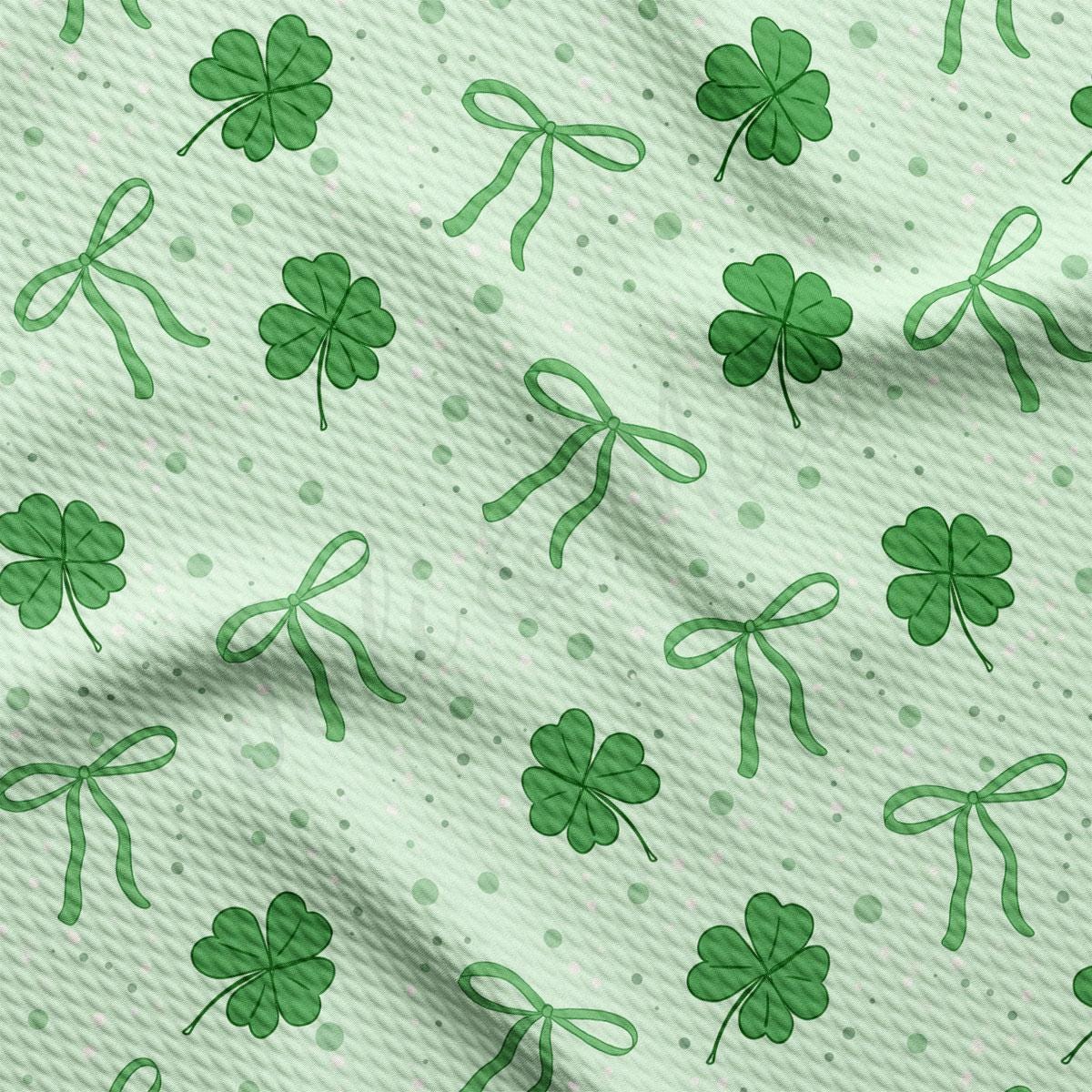 a green shamrock pattern on a white background