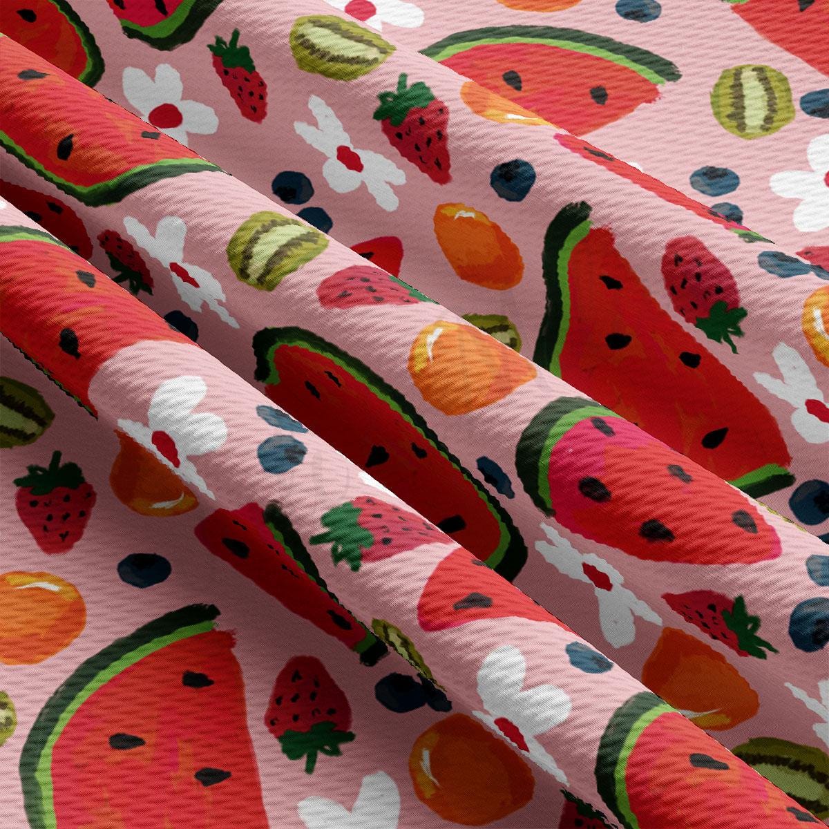 a pattern of watermelon and strawberries on a pink background