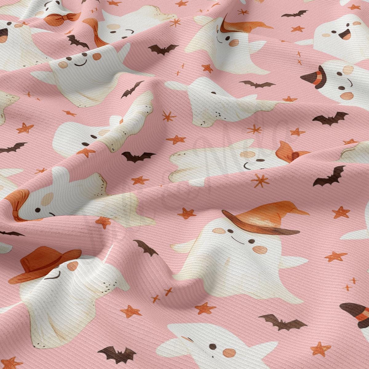 a repeating pattern of white ghost characters with orange hats and bats on a pink background.