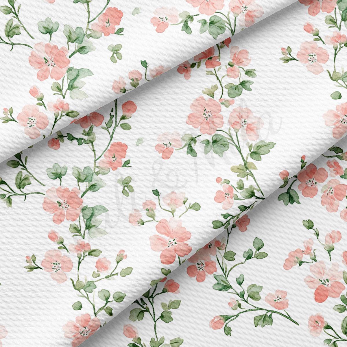 a repeating pattern of pink flowers with green leaves on a white background.