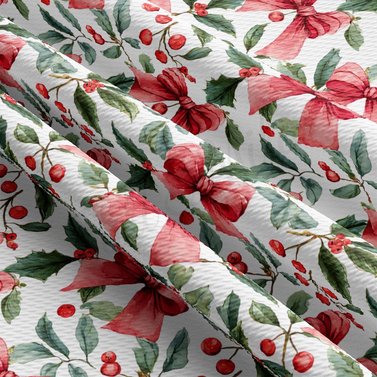 a close-up view of a fabric with a repeating pattern of red bows, holly leaves, and berries. The pattern is predominantly green and red, creating a festive and holiday-themed design.