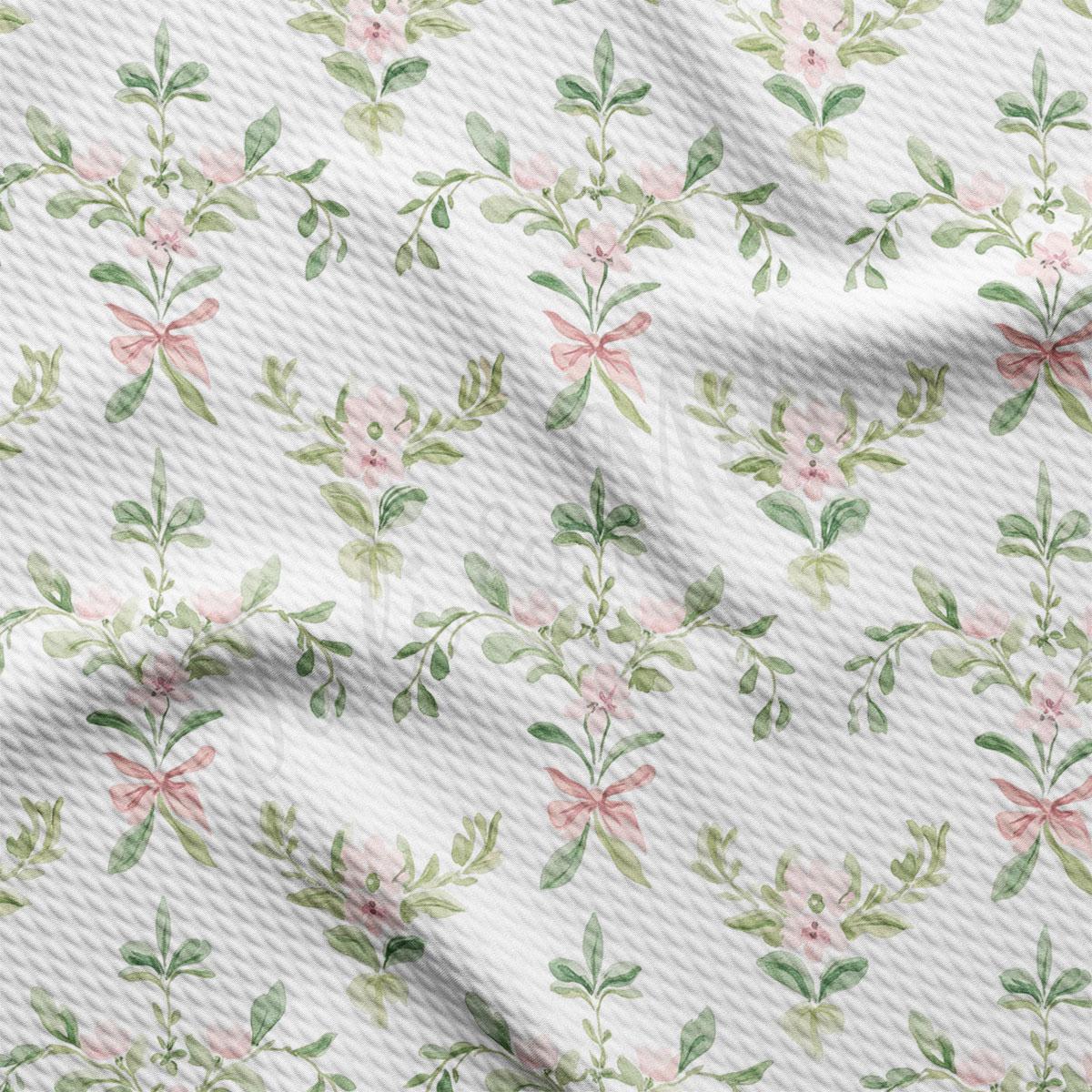 a repeating pattern of pink flowers with green leaves and bows on a white background.