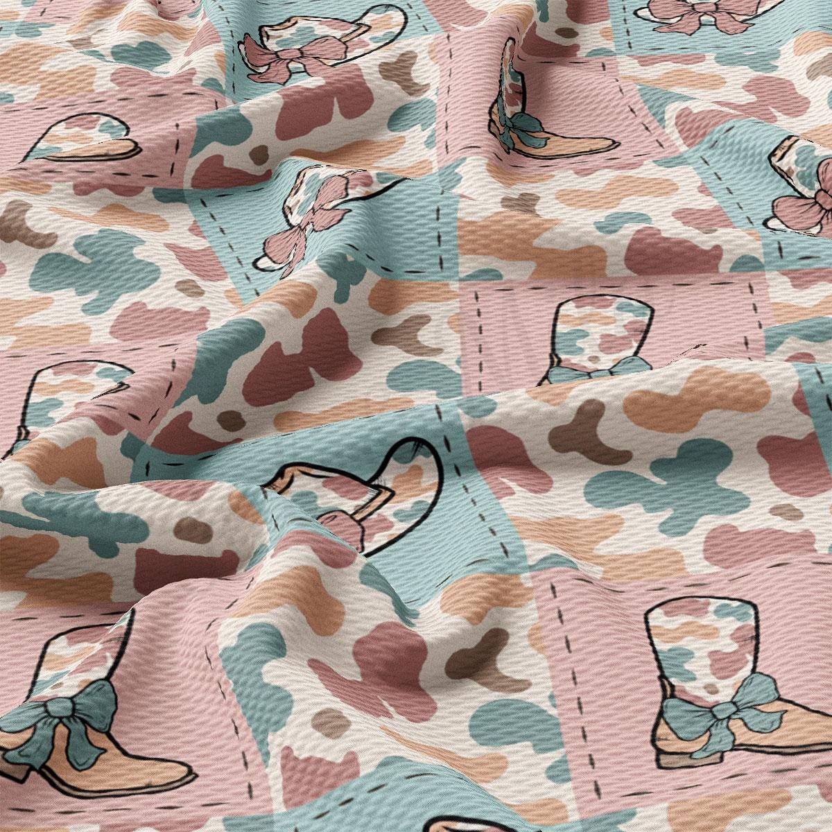 a pink and blue fabric with a picture of a boot on it