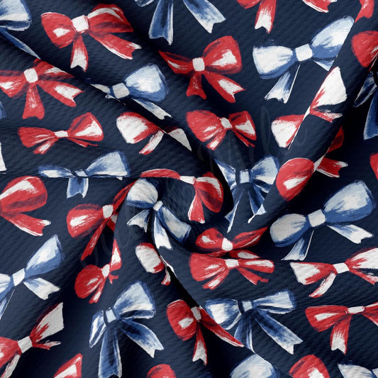 a red, white and blue bow tie on a blue background