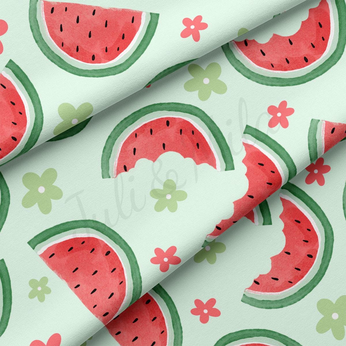 a pattern of watermelon slices on a white background