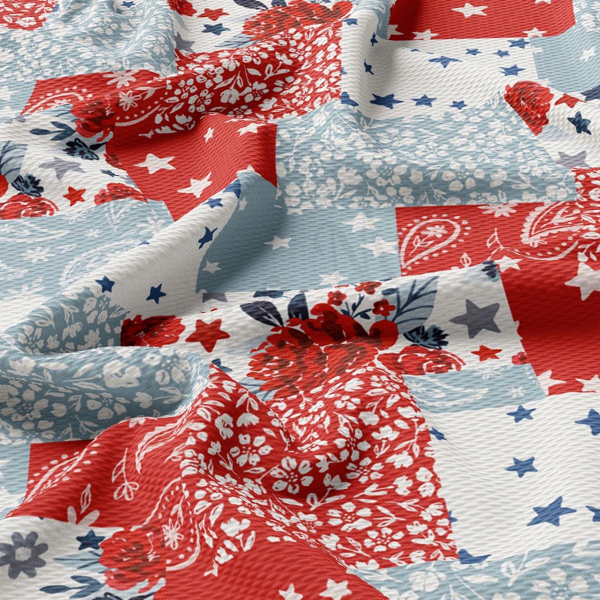 a red, white and blue quilt with stars on it