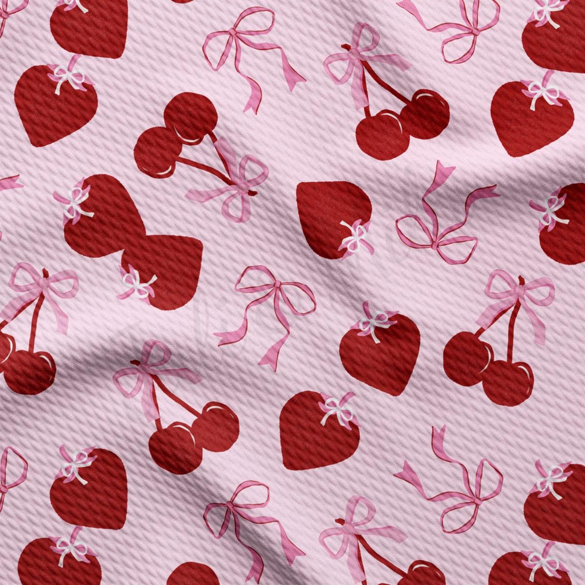 a pattern of cherries on a pink background