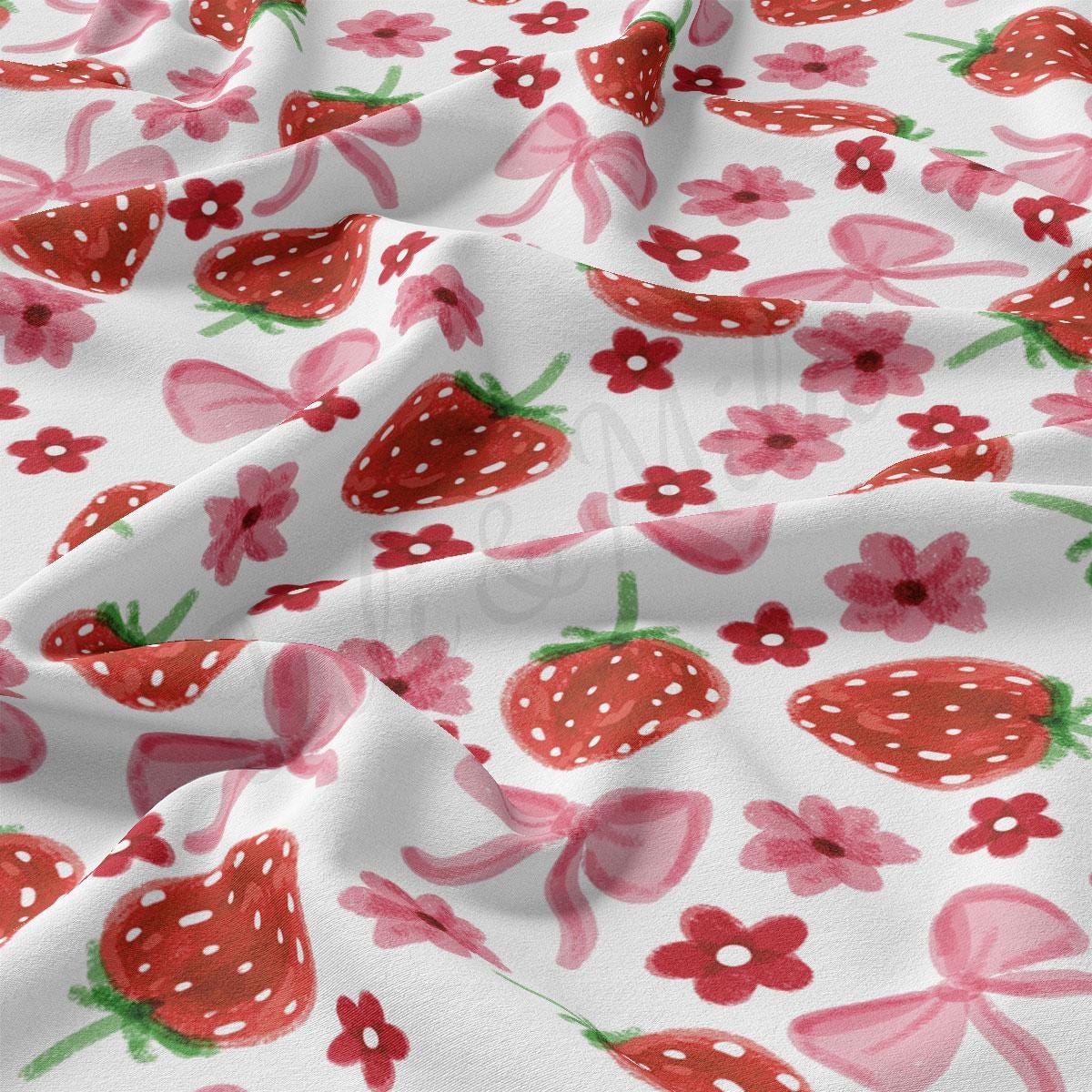 a close up of a strawberry print fabric
