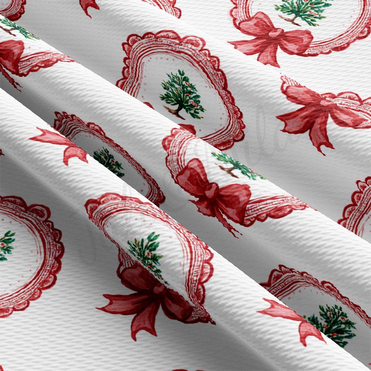 a close-up view of a fabric with a repeating pattern of red bows and green leaves, creating a festive and holiday-themed design.