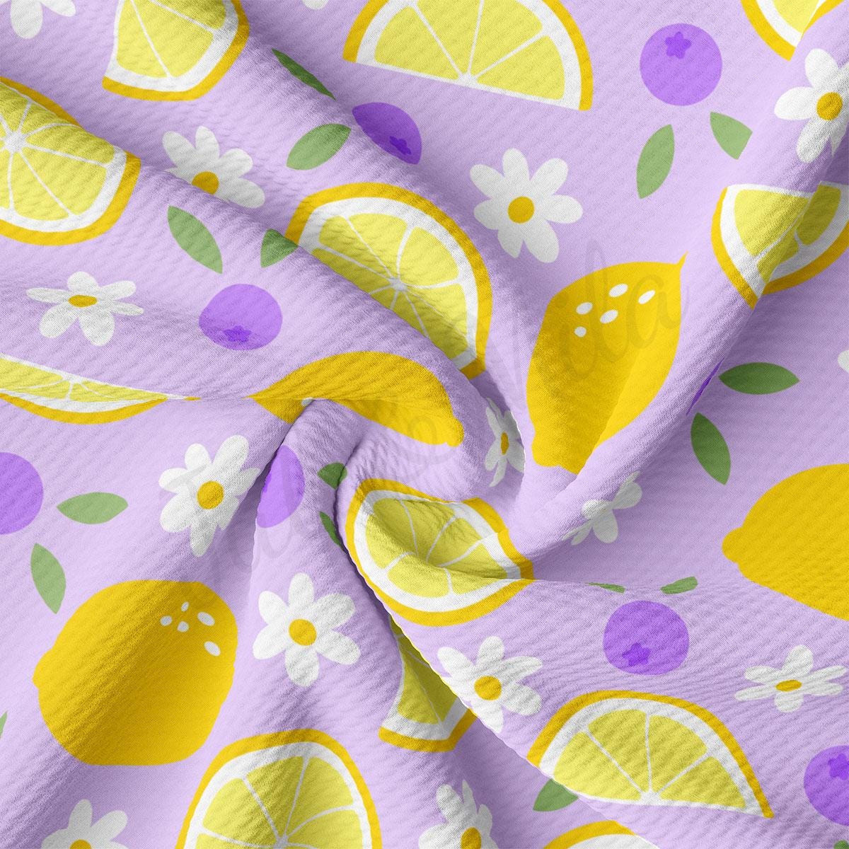a close up of a fabric with lemons on it