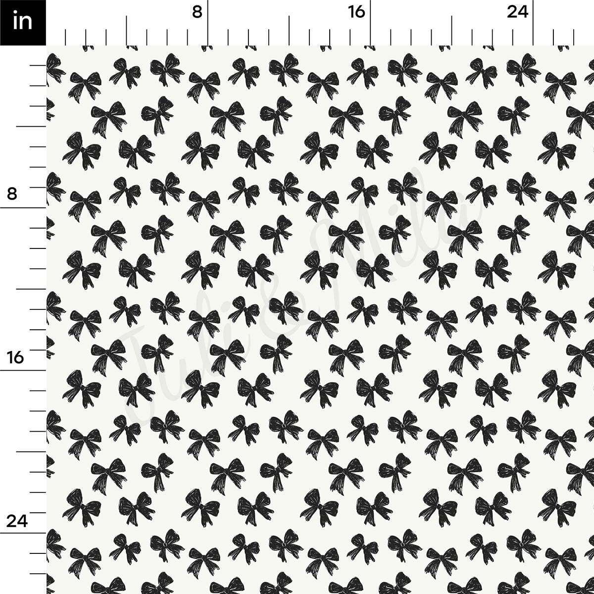 a repeating pattern of black bows on a white background.