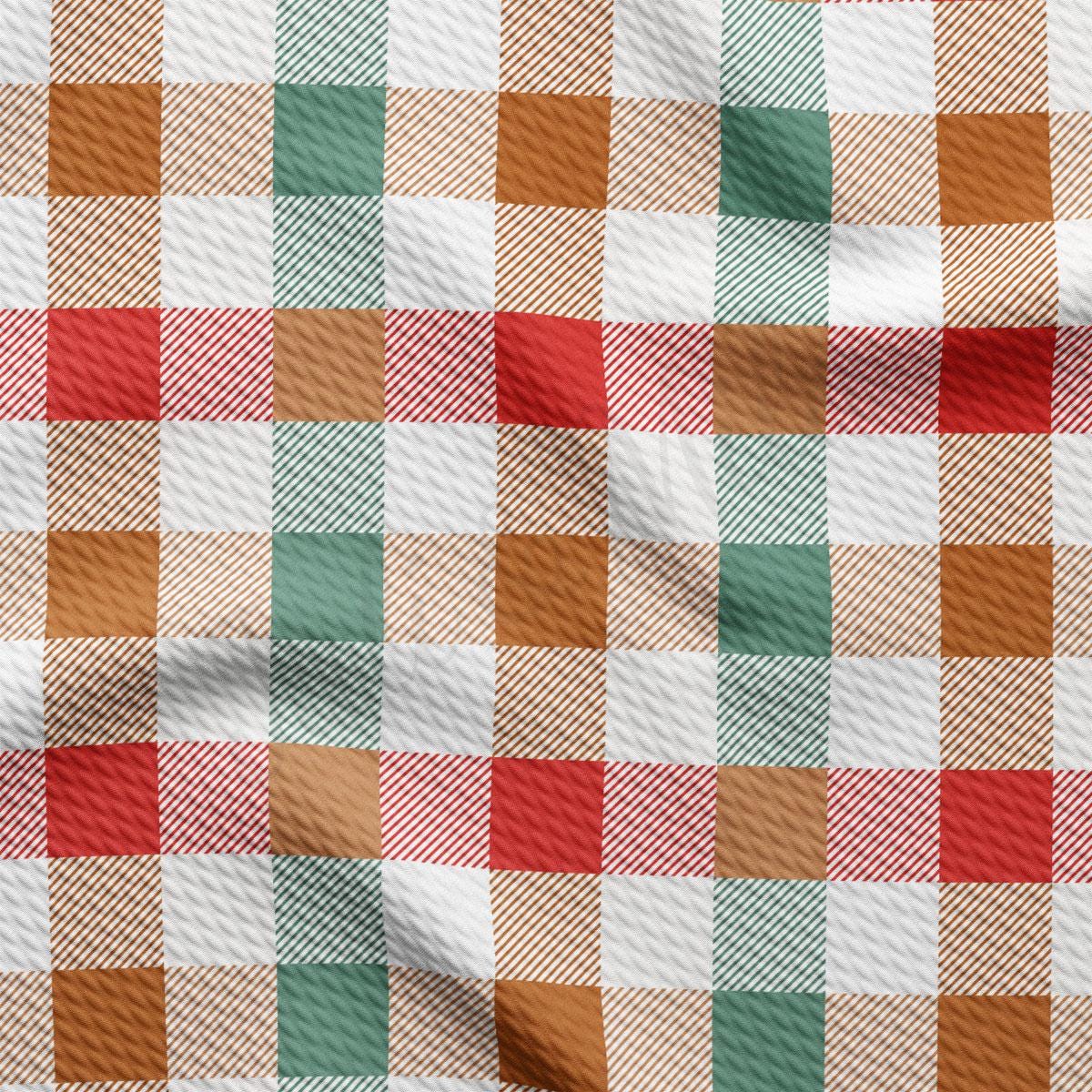 a close-up view of a fabric with a repeating pattern of red, green, and white squares, creating a checkered design.