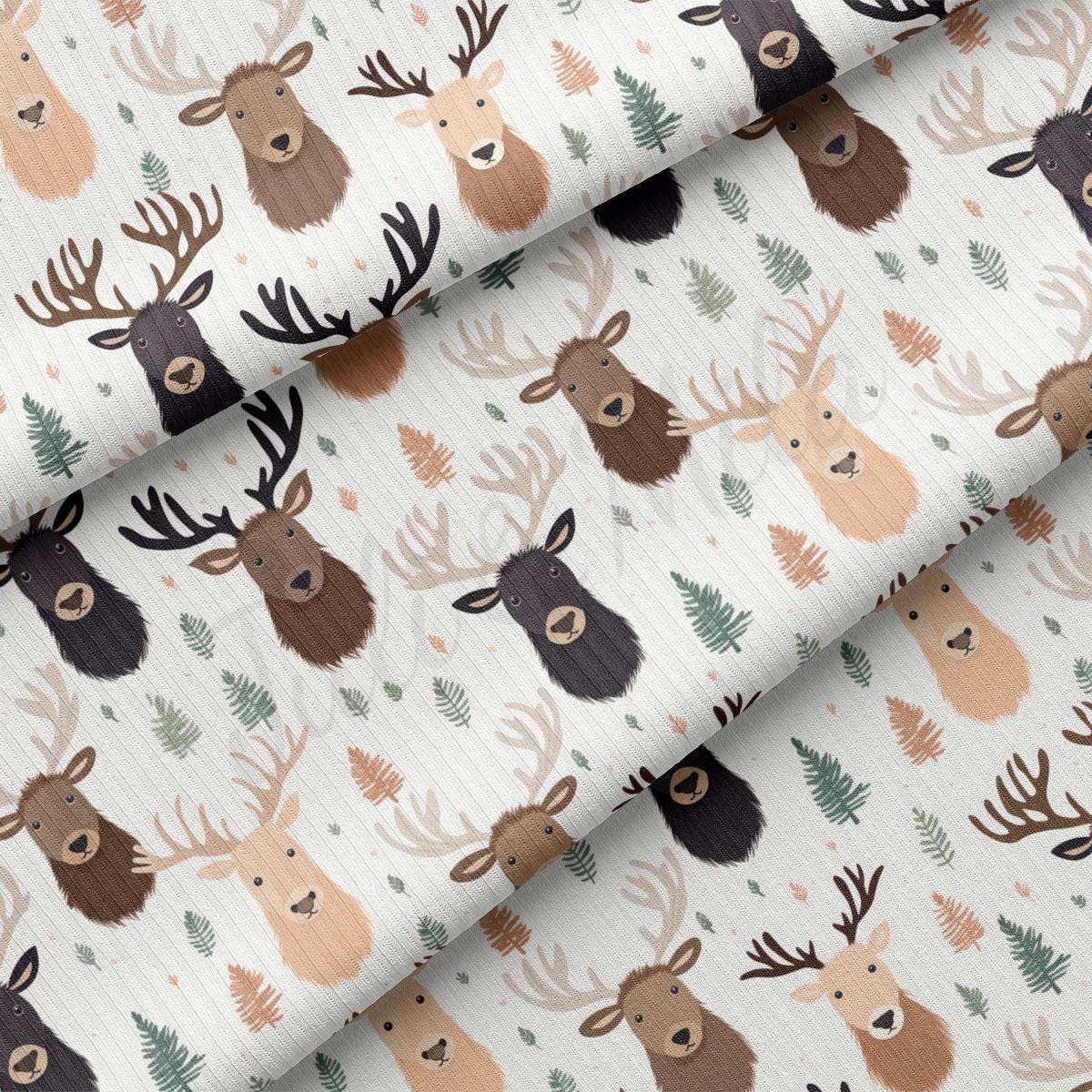 a close up of a pattern of deer on a white background