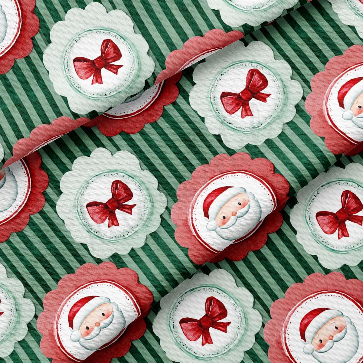 a repeating pattern of Santa Claus faces and bows on a green and white striped background.