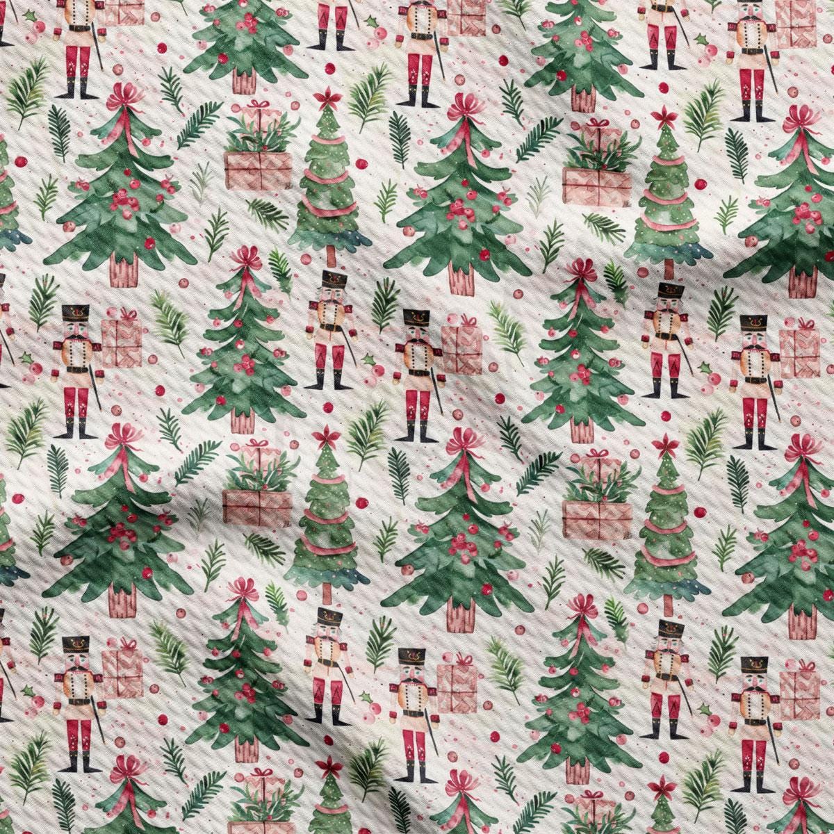 a repeating pattern of Christmas trees, nutcrackers, and presents on a white background.