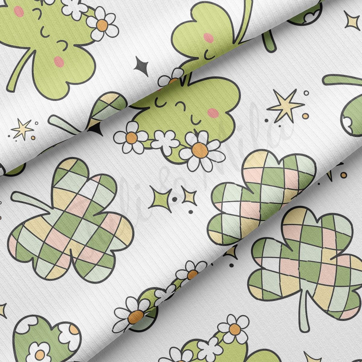 a close up of a pattern of shamrocks