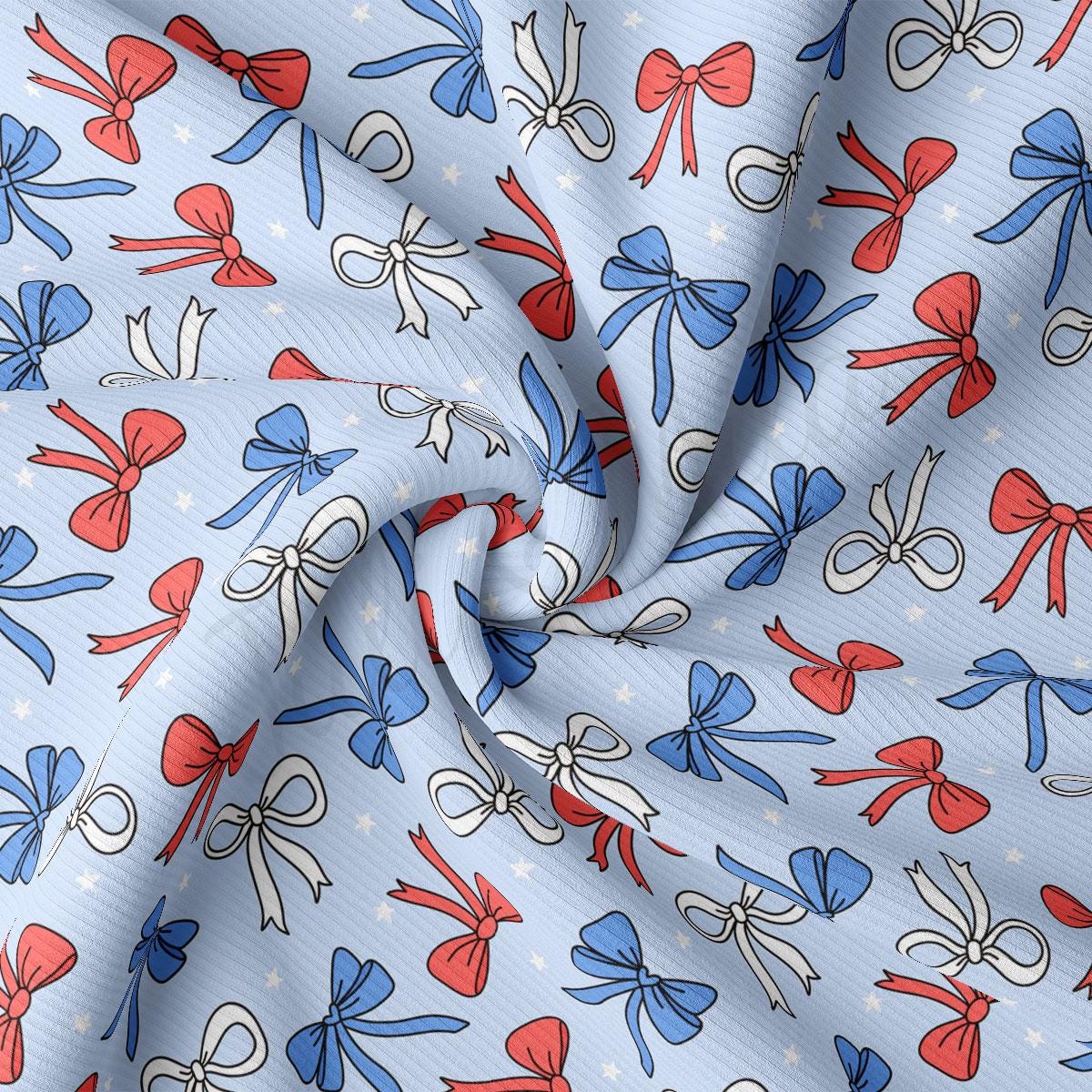 a blue background with red, white and blue bows
