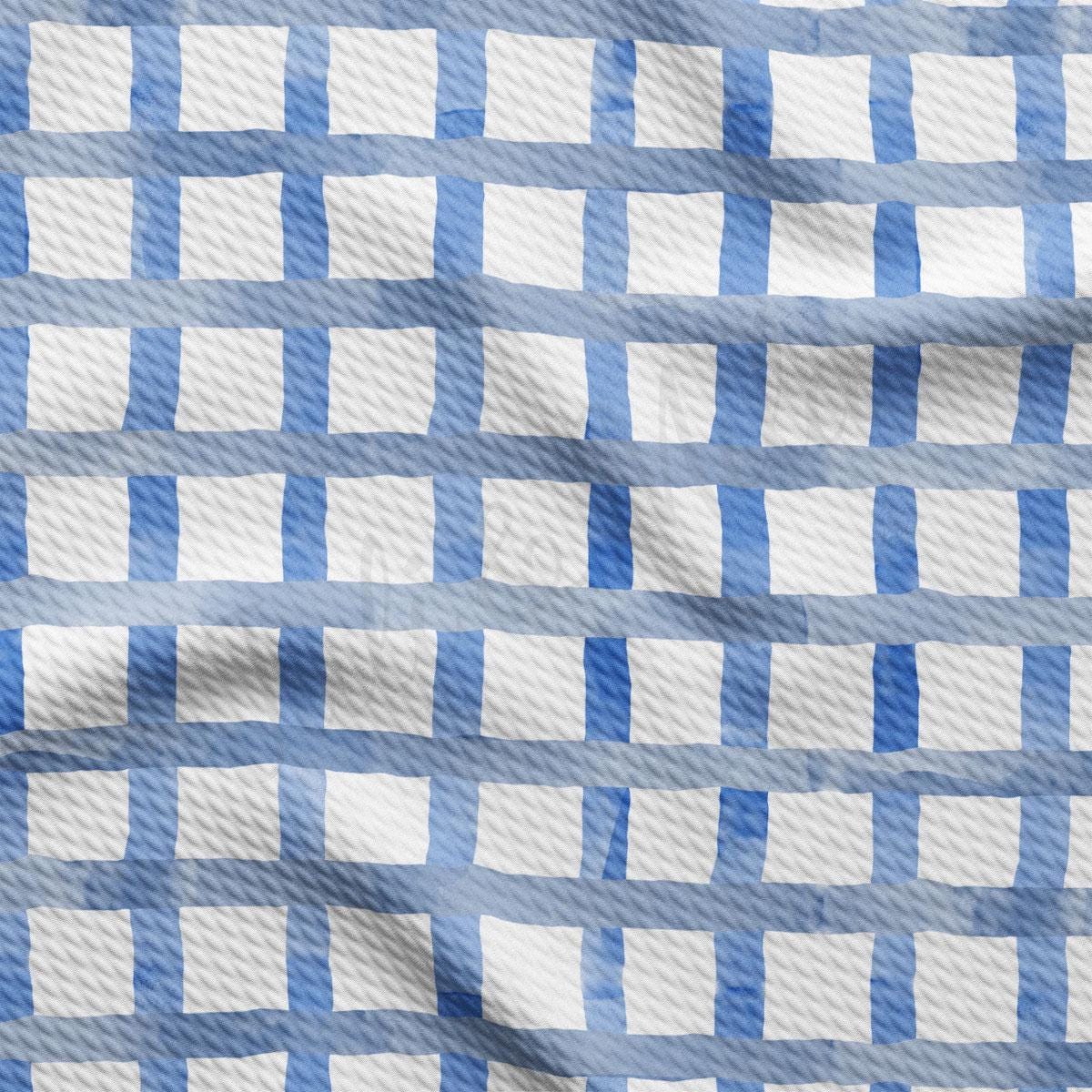 a blue and white checkered fabric is shown